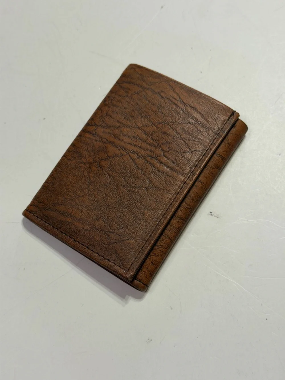 Rolfs brown textured leather bifold wallet